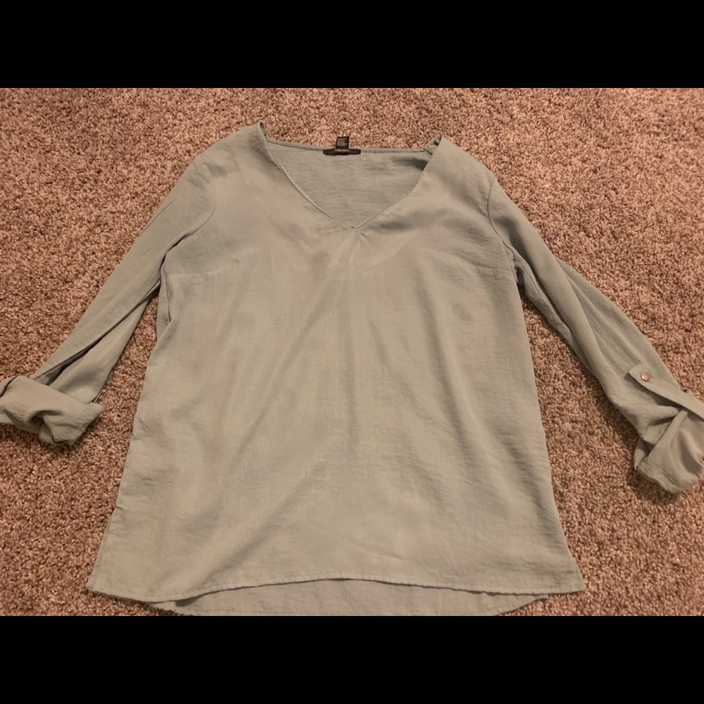 Light turquoise half sleeve blouse